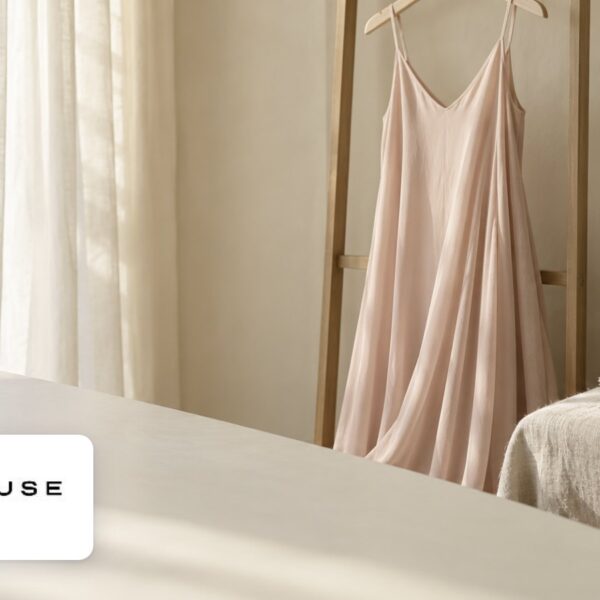 Hill House Home logo with flowing dress